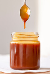 jar of caramel with spoon