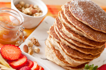 stack of pancakes with jam
