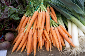 Pile of fresh raw various of vegetables, Carrots, beetroot selling in farmer market
