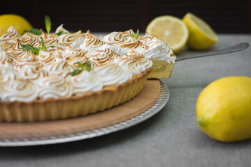 Obraz na płótnie Canvas citrus tart with lemons and mint 