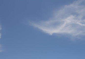 Beautiful white cotton-like clouds. White cloud cumulus. Water in the form of steam in the sky