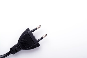 Black power cable with plug and socket isolated on white. electrical plug