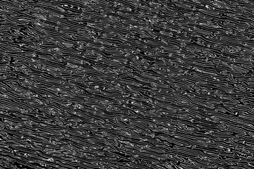 Studio Shot of Reflective Foldable Car Window Windshield Sun Shade Aluminium Foil. Silver-Black Unarranged Abstract Pattern for Background