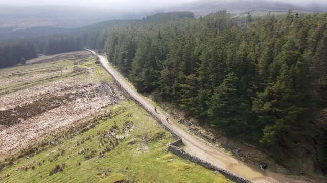 Aerial Drone View Cyclists On Stunning Forest Trail Peak District West Yorkshire Holmfirth Yateholme England Outdoors Activity