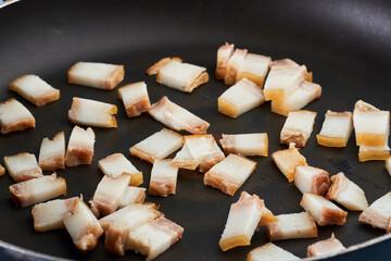 Diced pork ham in the pan