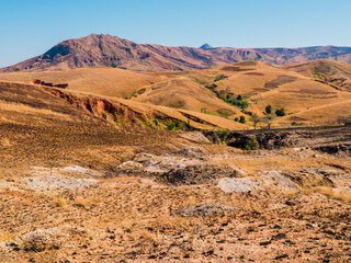 Fototapeta na wymiar Stunning landscape with colorful mountains in the highlands of Madagascar 