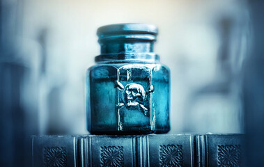 Glass poison bottle with skull and bones. Danger sign, symbol of death. Concept background on...