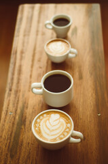 cup of coffee on wooden table