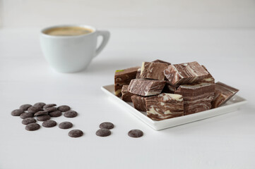 Chocolate halva with black coffee with foam