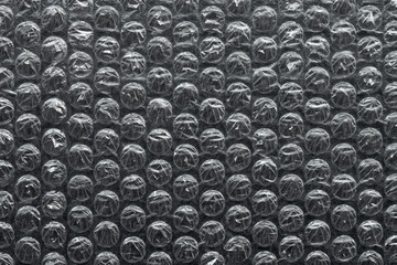 Bubble wrap foil texture useful as a background. The repetitive pattern of packaging material