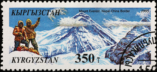 Mount Everest at China-Nepal border on postage stamp