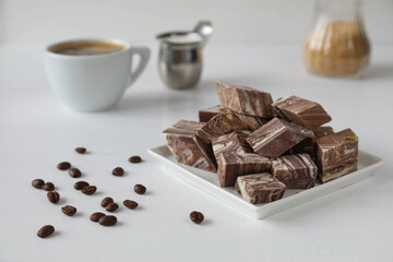 Chocolate halva with coffee with milk and cane sugar