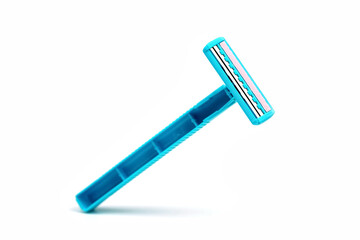 Blue scraper isolated on white background.Removal of unwanted hair. Skin care concept. Epilation hair removal.	

