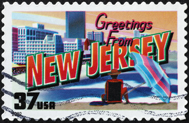 Greetings from New Jersey postcard on stamp