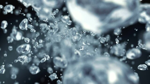 Water drops flying in super slow motion 4K