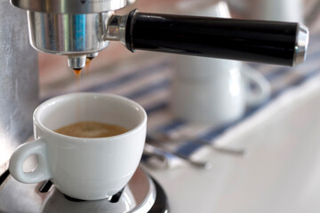 Professional home coffee maker in modern kitchen