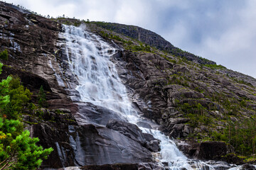 Fototapeta premium Langfossen Langfoss waterfall in summer, Etne, Norway