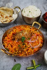 Indian meal buffet Background - Chicken Biryani chilli chicken butter Naan salad Salan