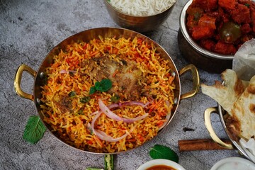 Indian meal buffet Background - Chicken Biryani chilli chicken butter Naan salad Salan