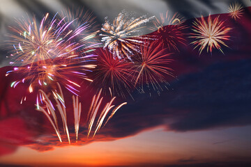 Night sky with fireworks and flag of Poland