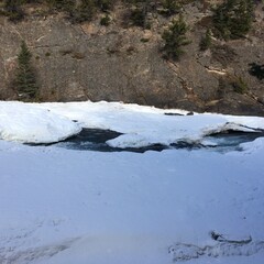 Scenic view of Bow falls and the spectacular surrounding landscape