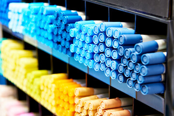 Fototapeta premium Colored blue yellow markers on store