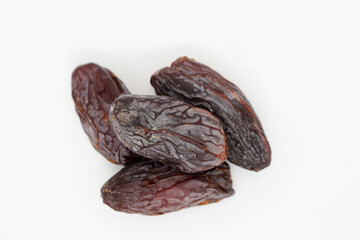 Fresh dried dates Medjool, close-up isolated on white background. Iftar food