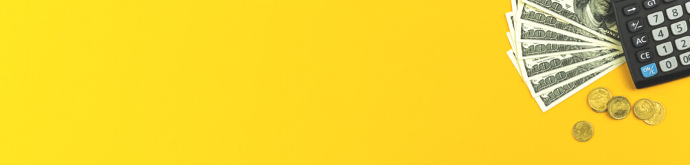 Fototapeta premium Banner calculator and money, business and financial concept with copy space