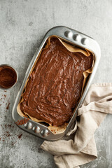 Chocolate brownie dough before bakingб flat lay, top view