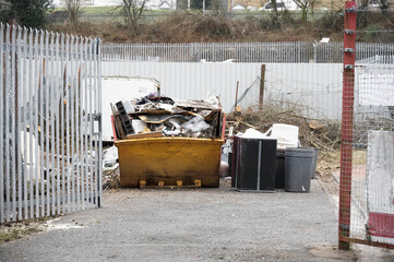Rubbish and garbage in skip for disposal at dump site