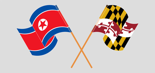 Crossed and waving flags of North Korea and the State of Maryland