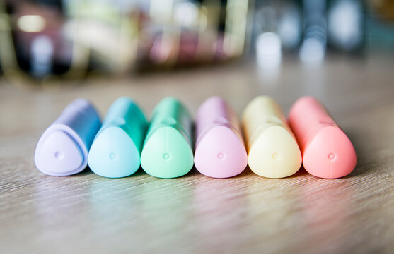 pastel markers on the desk, multicolored, rainbow colors, education, office tools