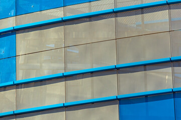 Ventilation panel on the facade of the building. rainscreen. exterior wall. Blue white perforated...