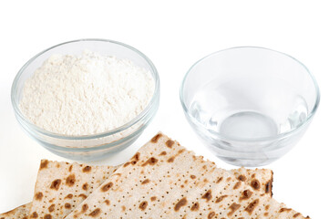 Jewish matzah on white background. Jewish traditional Passover bread. Pesach celebration symbol. Close-up