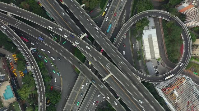 day time guangzhou city downtown traffic street road junction aerial topdown panorama 4k china