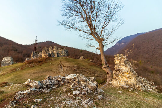 Abkhazia, Gagra district, urban-type settlement Bzyb village Akvara.  9th-10th-century church in ruins and medieval fortress of clan of Inal-Ipa. Destroyed Orthodox Church. Evening mountains landscape