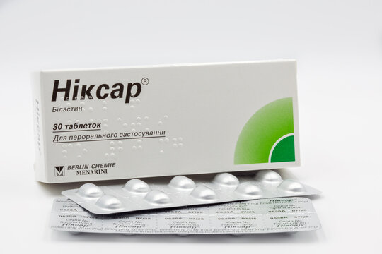 Nixar bilastin tablets by Berlin Chemie Menarini closeup against white.