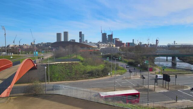 STARTFORD CITYSCAPE WITH BUSY TRAFFIC INFRON OF ELISABETH OLYMPIC PARK AERIAL