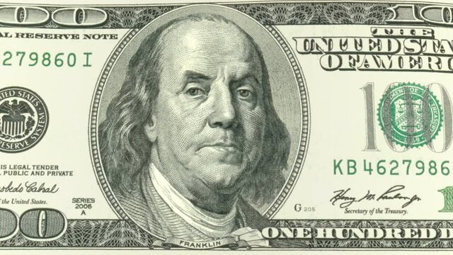One hundred dollars. Benjamin Franklin is angry.  An animated face of Benjamin Franklin on a hundred dollar bill. Two luma matte channels.