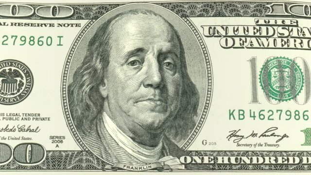 One hundred dollars. Benjamin Franklin is sad. An animated face of Benjamin Franklin on a hundred dollar bill. Two luma matte channels.