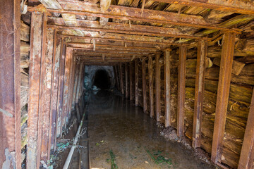 Fototapeta na wymiar The tunnel in an abandoned mine in Serbia