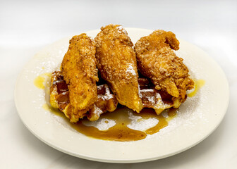 chicken strips on a waffle