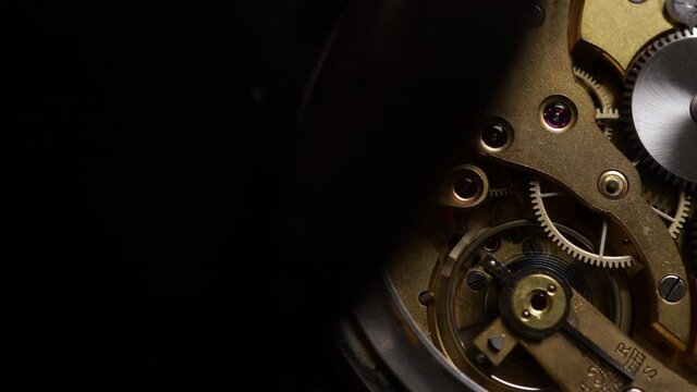 working clockwork gears (clock mechanism) inside a vintage clock