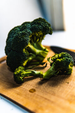 broccoli cut on kitchen board