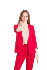 a young woman in a red business suit, beige blouse, with long hair. Isolate on a white background.