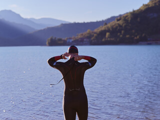 triathlete swimmer portrait wearing wetsuit on training