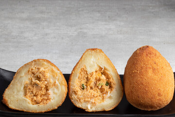 Traditional Brazilian food, coxinha of chicken.