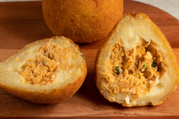 Close up of coxinha of chicken. Brazilian snack.