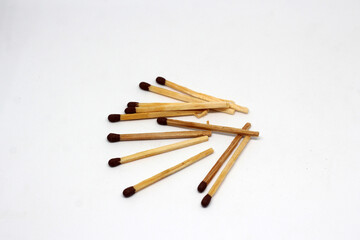 Wooden match isolated on white background.