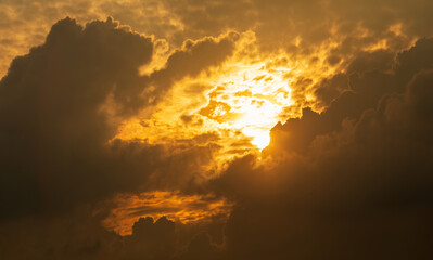 Cloud and Sunlight Sunbeam or Sunray through the blue sky at sunset or evening time.